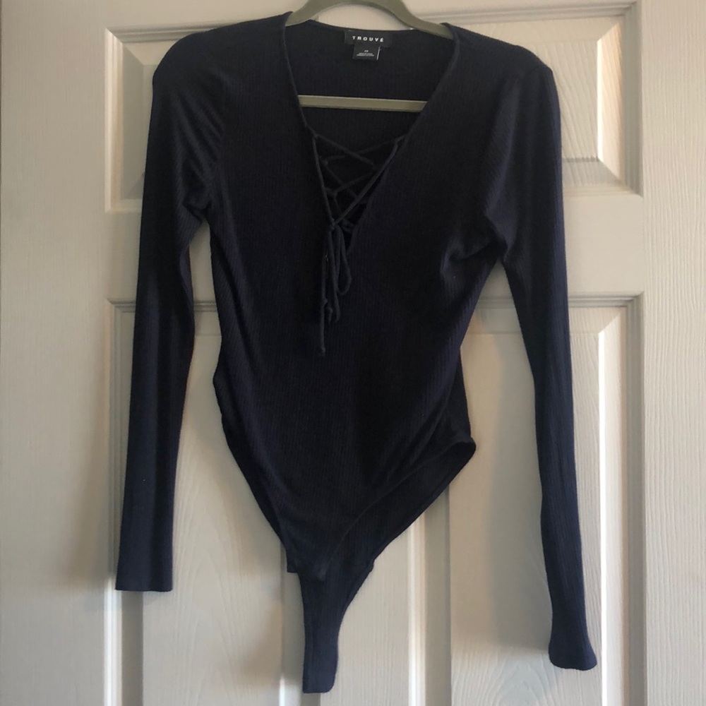 Navy blue body suit with lace up detail